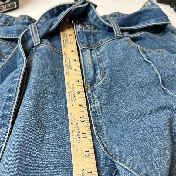 Dolls Kill Momokrom high waisted denim with frayed hem and silver buckle belt. - Picture 11 of 14